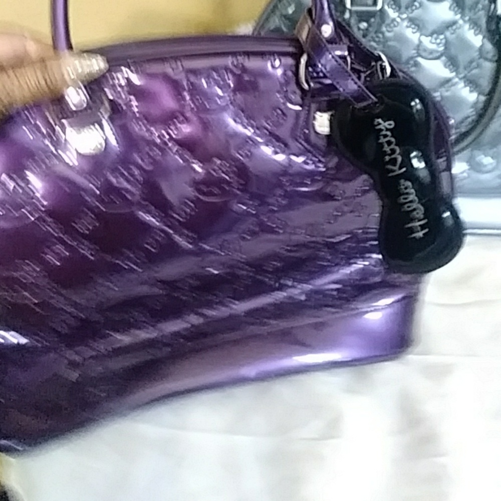 Purses by a hello 🐱